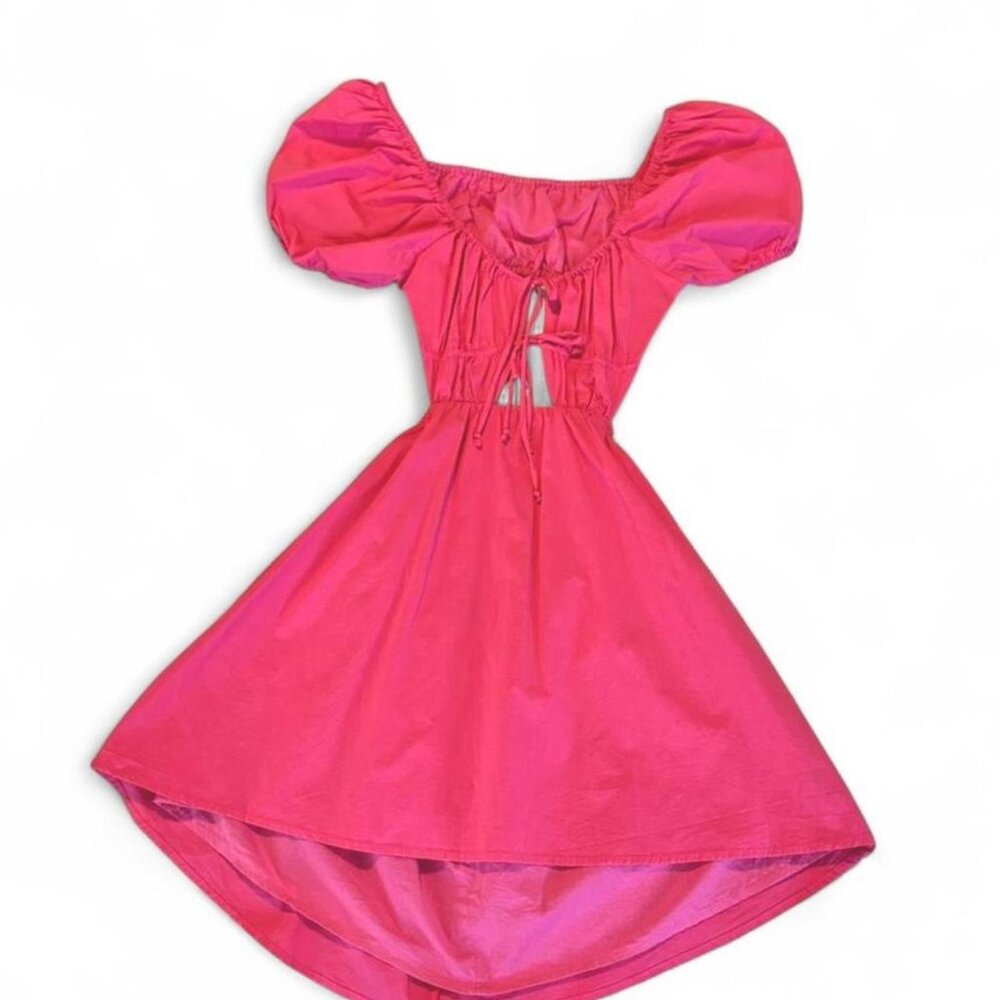 Pink babydoll dress with puffed sleeves and tie front